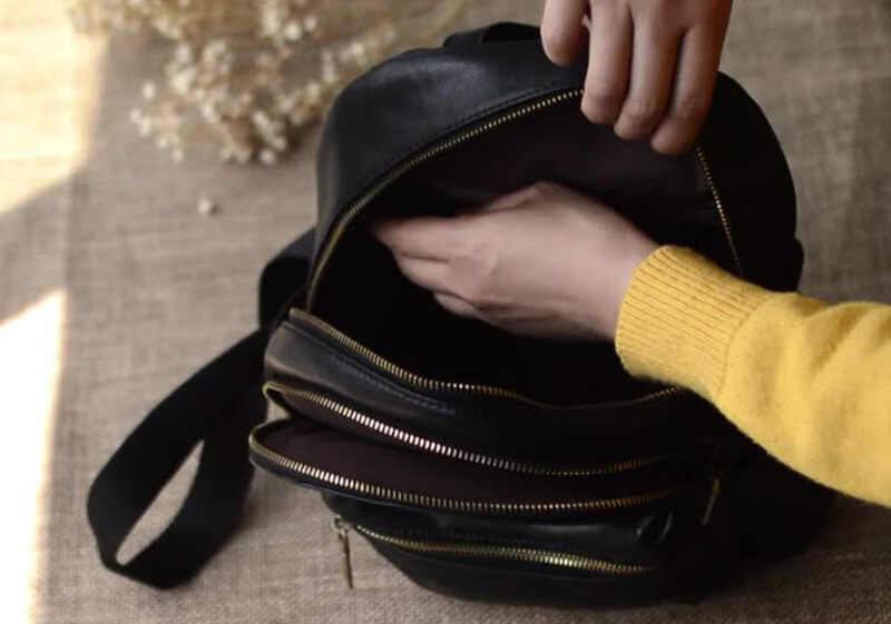 Damen Rucksack Leder schwarz schlicht mit Reißverschluss