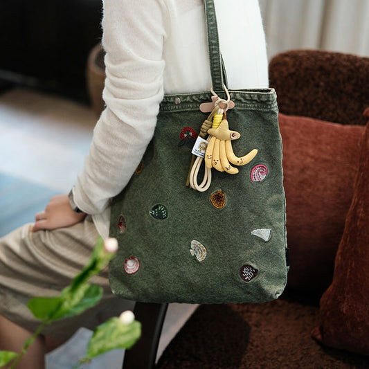 schultertasche stickerei