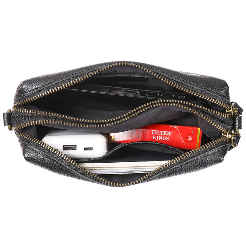 Kleine Damen Umhängetasche Leder modern mit Handgelenkgurt in Schwarz und Braun